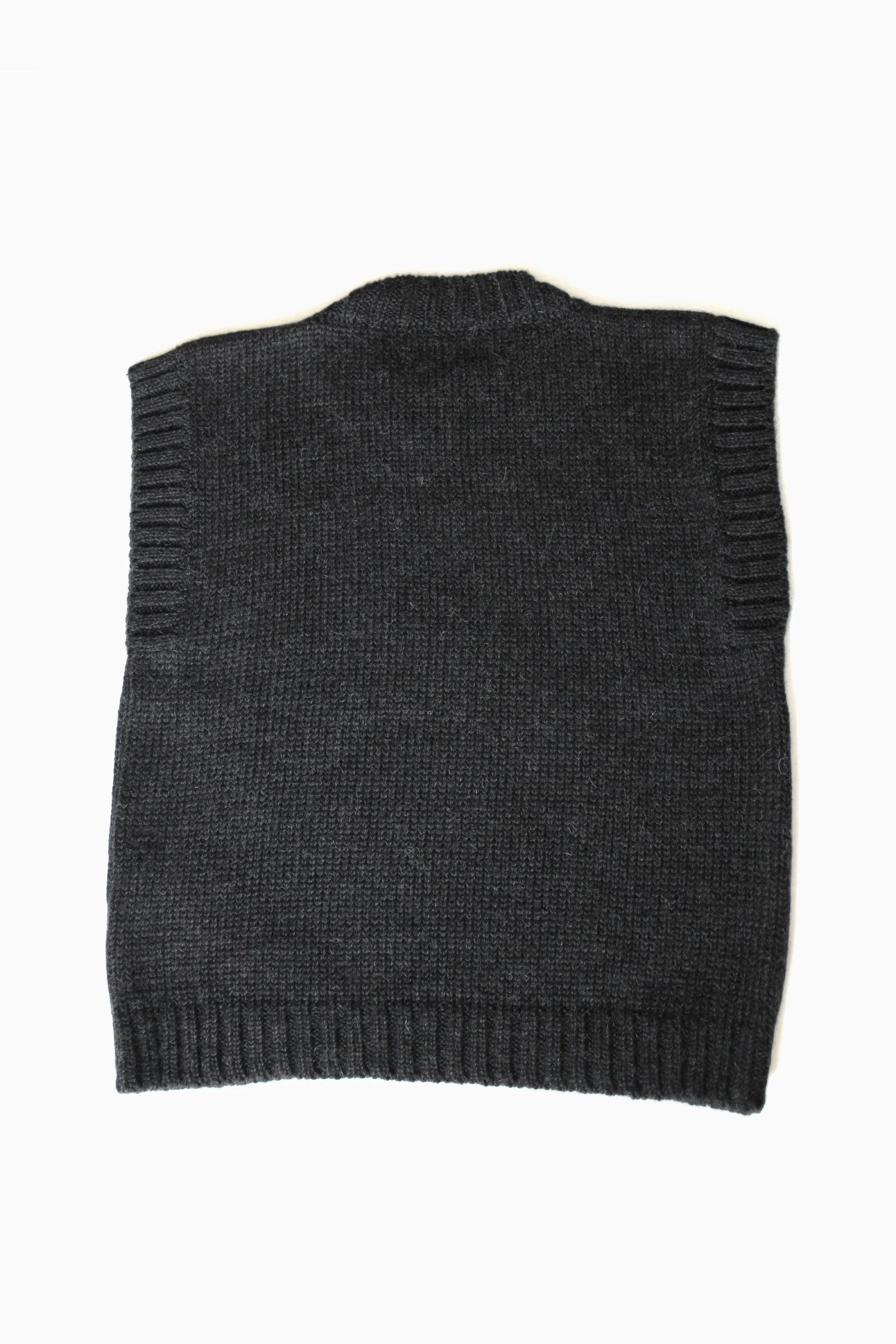 Charcoal baby alpaca sleeveless vest with ribbed crewneck on white background