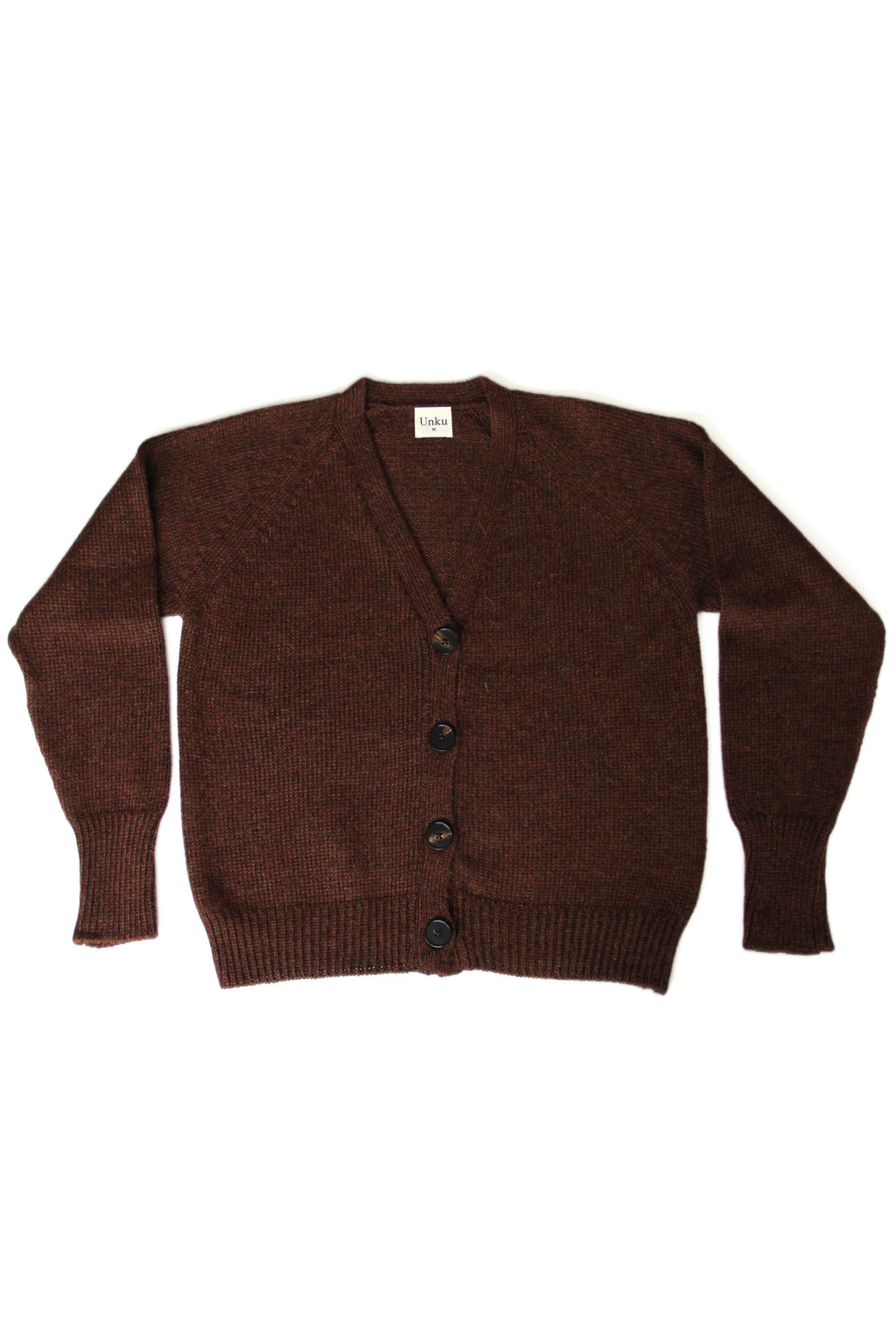 Brown 100% baby alpaca cardigan with black horn buttons on a white background
